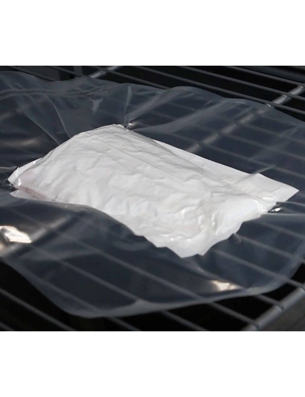 Aliment enroulé dans la toile IMFUM Nature® mis sous vide - cuisson basse température