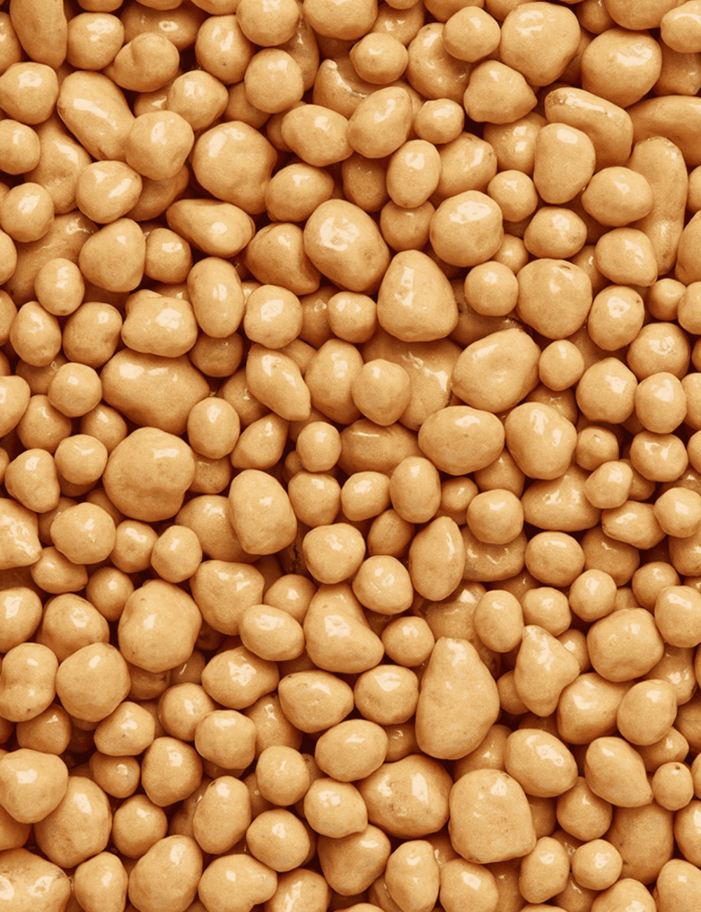 Peta Crispy Caramel Beurre Salé - Vue détaillée de la texture et couleur des granules, fini laqué - Sosa