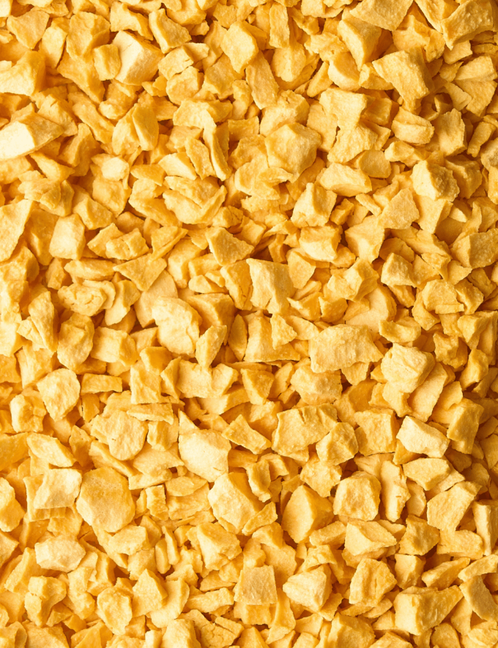 Passion Fruit Crispy - Detailed view of golden yellow colour and mat appearance of the freeze-dried fruit pieces - Sosa