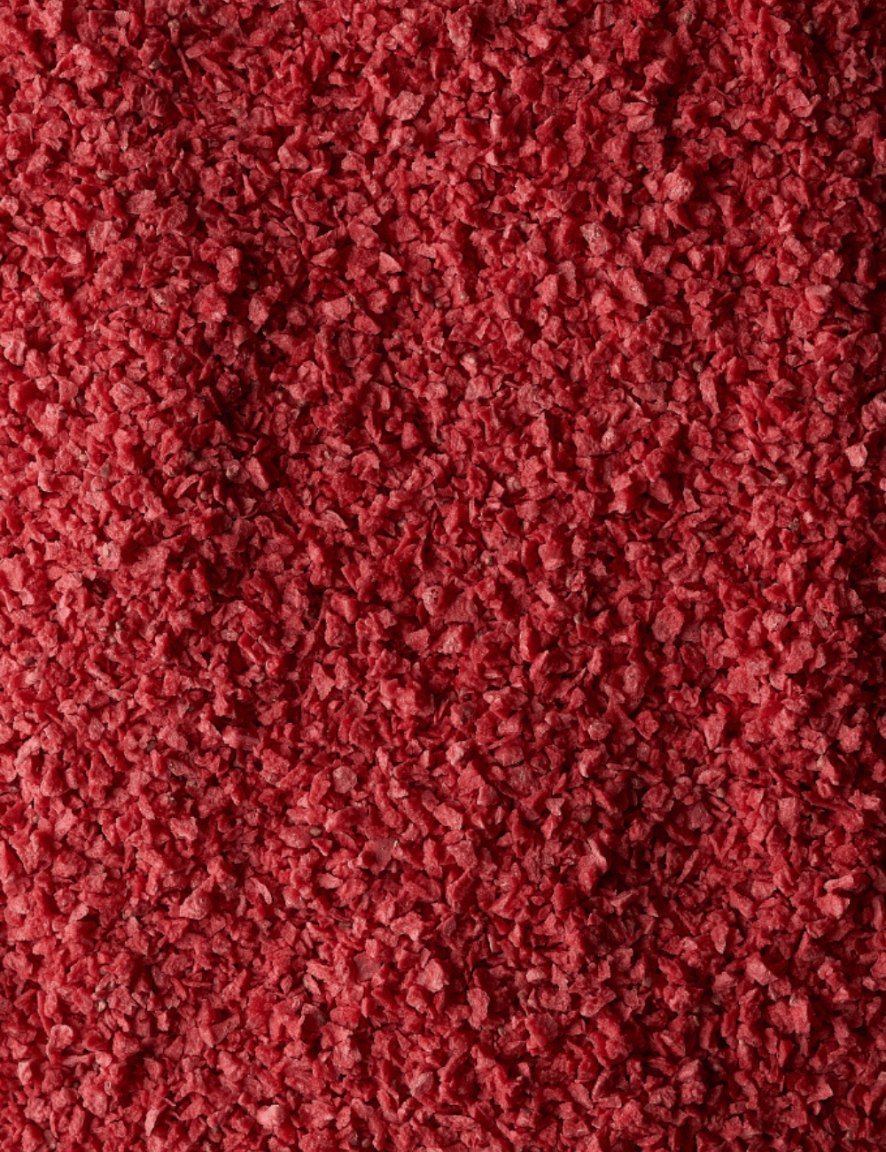 Strawberry Crispy 1-3mm - detailed view of homogeneous fine pieces, deep pink colour, matte finish - Sosa